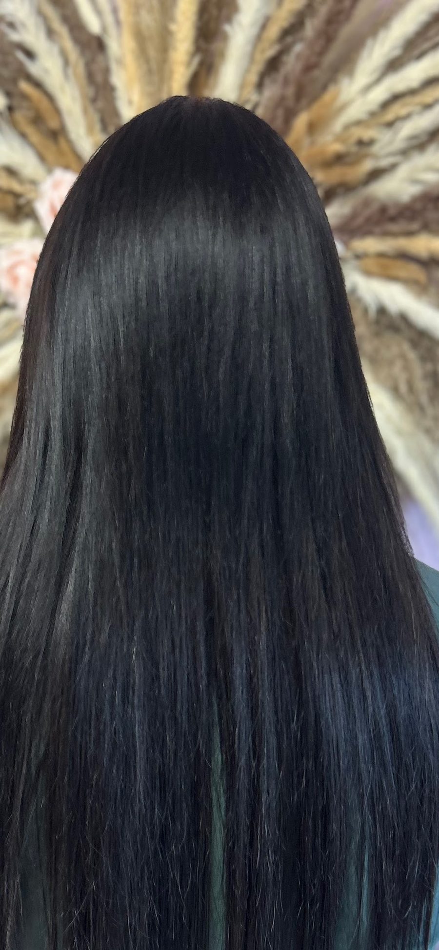 Glossy jet-black full head colour, straight finish