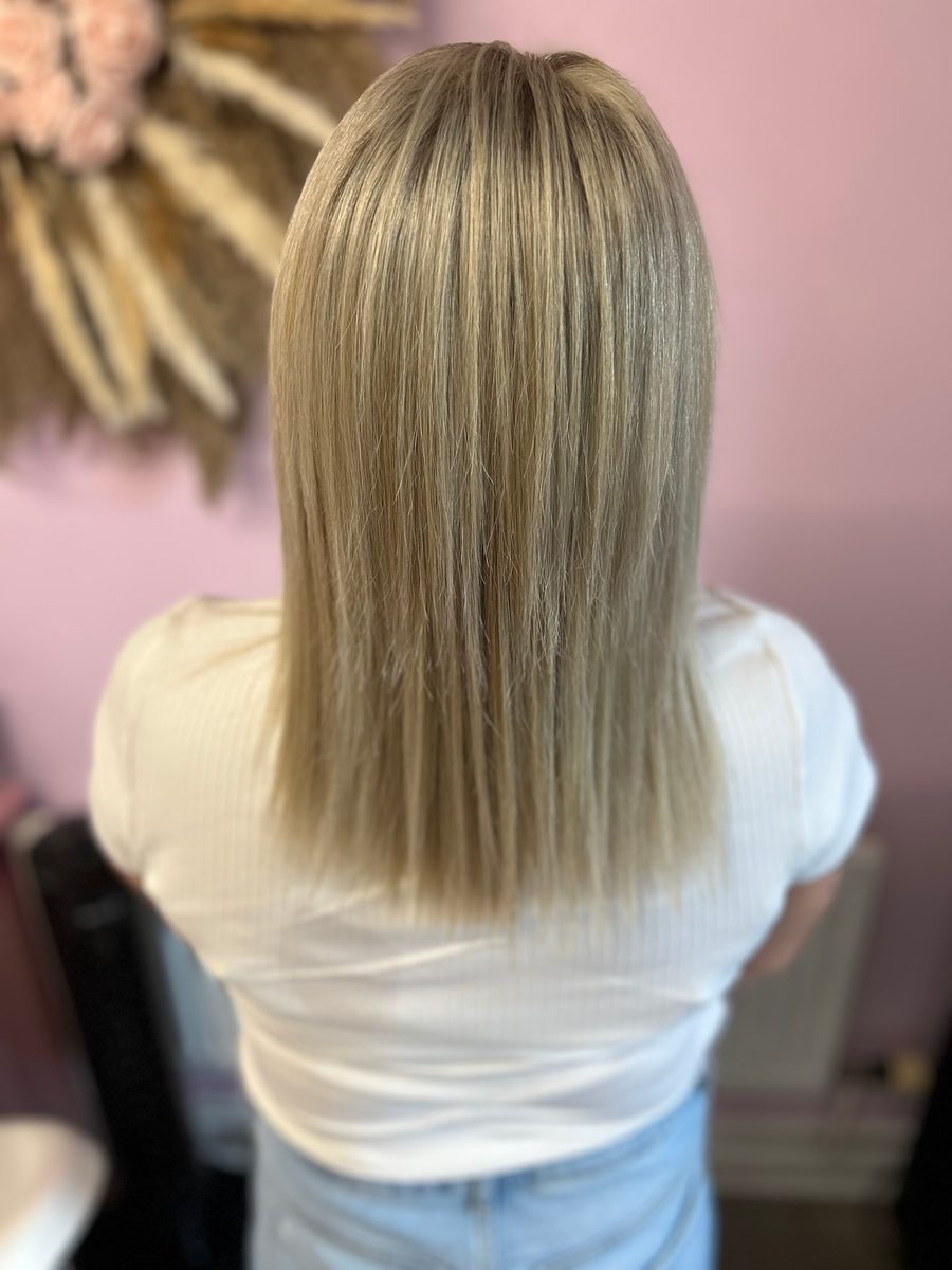 Sandy blonde full head highlights, straight finish